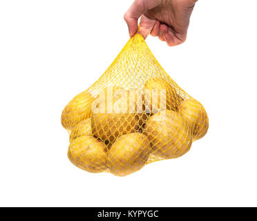 Kartoffeln frisch in das Paket. Mann hält in der Hand Stockfoto