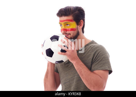 Nervös Fußballfan mit Soccer Ball nach vorn Stockfoto