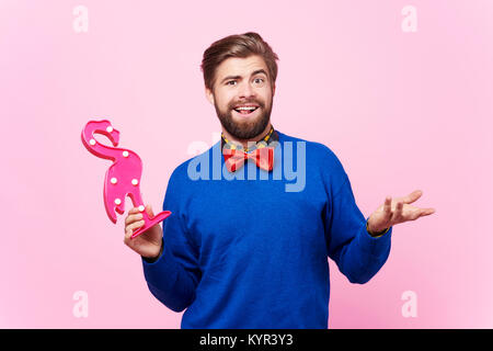Studioaufnahme des verwirrten Menschen Stockfoto