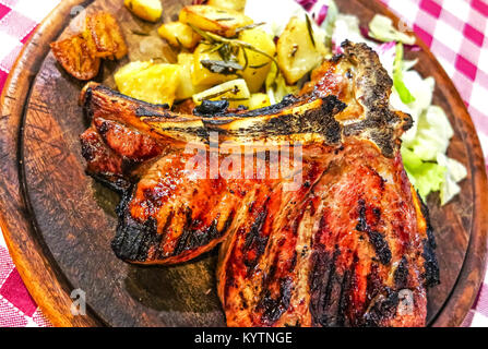 Bistecca alla Fiorentina, ein Italienisches steak Klassiker aus der Toskana, Italien Stockfoto