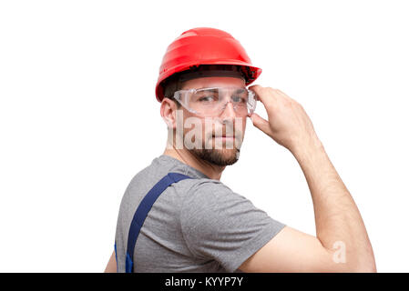 Isolierte Handwerker Bauarbeiter assembler Handwerker - freundliche Mitarbeiter in Arbeitskleidung auf weißem Hintergrund Stockfoto