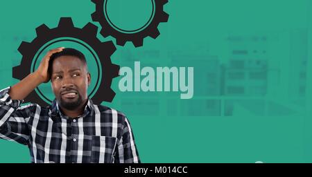 Verwirrt Mann hält seinen Kopf und Suchen auf der rechten Seite mit Zahnrädern Stockfoto