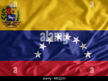 Fabric Textur der Flagge Venezuelas Stockfoto