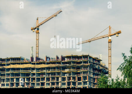 Crains auf der Baustelle von Gebäude Stockfoto