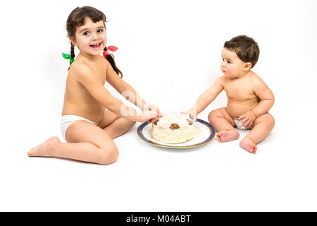 Kinder essen Kuchen Stockfoto