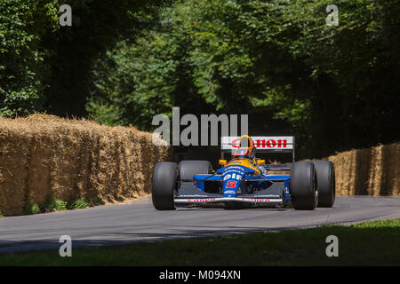 Nigel Mansells iconic red Anzahl 5 in Goodwood Festival der Geschwindigkeit Stockfoto