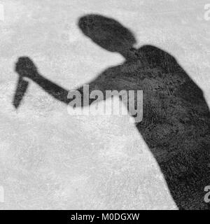 Schatten eines Menschen auf dem Boden Textur. Stockfoto