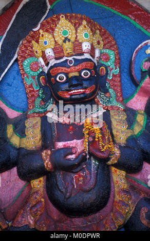 Nepal, Kathmandu. Durbar Square. Bild von Kala Bhairab in der Nähe der Hanuman Dhoka Palast Eingang. (Hindu). Stockfoto