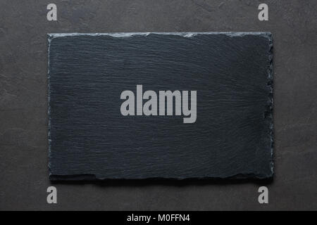 Schwarzer Schiefer Hintergrund Tabelle Ansicht von oben. Kochen, Restaurant Menü schwarzes Brett Menü Hintergrund mit Kopie Platz für Text. Stockfoto