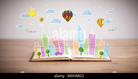 Farbenfrohe Stadtbild Zeichnung auf Buch öffnen Stockfoto