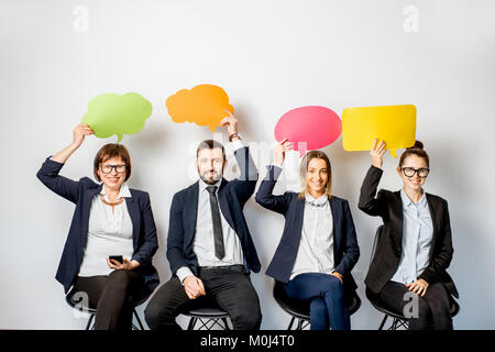 Business Menschen mit bunten Blasen Stockfoto