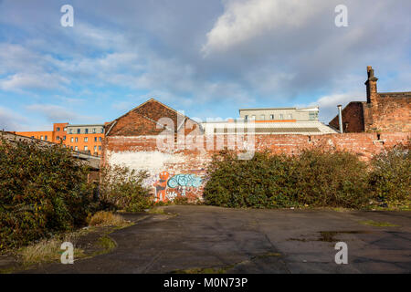 Graffiti an der Wand von einer alten Fabrik Gebäude im Zentrum von Sheffield, South Yorkshire, Großbritannien Stockfoto