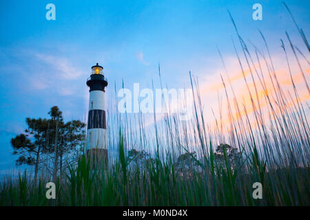 Körper Insel Leuchtturm bei Sonnenuntergang Stockfoto