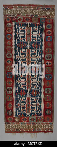 Dieser Teppich, der in der MET-Kollektion als DP148549 aufgeführt ist, ist ein Stück Textilkunst, das Design und Handwerk repräsentiert und die historische oder kulturelle Bedeutung des Textildesigns widerspiegelt. Stockfoto