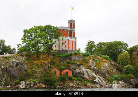 Kastellet mit schwedischer Flagge auf kastellholmen Insel in Stockholm, Schweden. Stockfoto