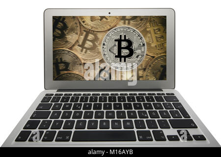 Symbol Bild Turbulenzen, Volatilität, Aktienkurs digitale Währung, Gold physischen Münze bitcoin Laptop Stockfoto