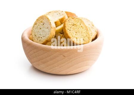 Knuspriges Brot bruschetta in Houten auf weißem Hintergrund. Stockfoto