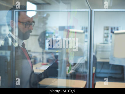 Business Executive auf Haftnotizen Stockfoto