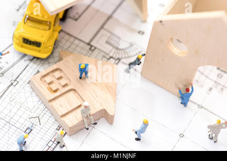 Miniatur Arbeiter, das Konzept der Baustelle Stockfoto