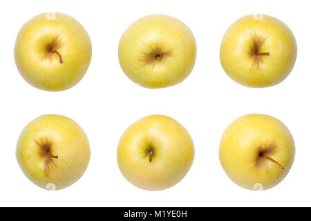 Golden Delicious äpfel auf weißem Hintergrund. Ansicht von oben Stockfoto