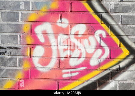 Schreiben Jesus auf einem bunten Wand Stockfoto