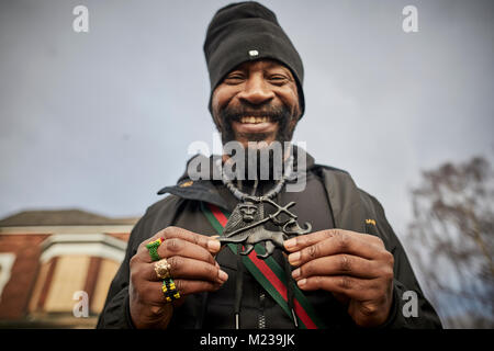 Moss Side Manchester Rastafari, manchmal Rastafarianismus Lion Kette halslose Darstellung des Löwen von Juda bezeichnet Stockfoto