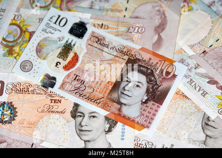 Neue Polymer 10 quid stellt mit bald auslaufen Papier 10 Pfund Noten in Großbritannien. Stockfoto