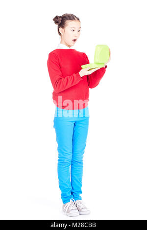 Schulmädchen holding Lunchbox Stockfoto