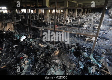 DHAKA, BANGLADESCH - November 25, 2012: Die tazreen Moden Fabrik nach dem Brand. Textilfabrik, in denen sich ein Brand 112 Menschen getötet, Dhaka, Bangladesch Stockfoto