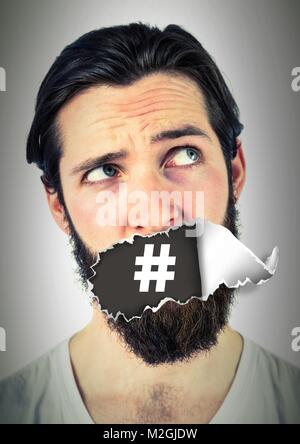 Hashtag Symbol und Mann mit zerrissenem Papier auf Mund Stockfoto