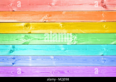 Pastellfarben bunten Regenbogen bemalt Holzplanken Hintergrund Stockfoto