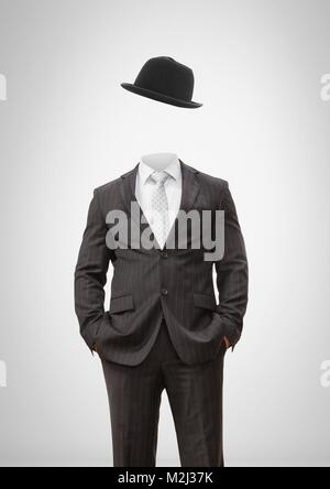 Mann ohne Kopf mit surreal Floating hat Stockfoto