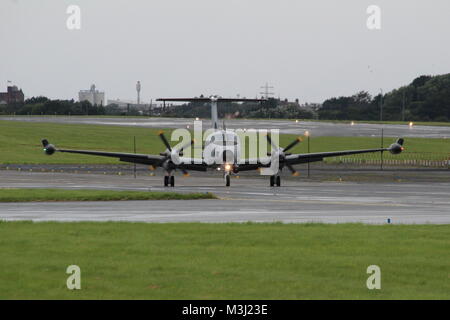 91-00516, einer Beechcraft RC-12 X Schutzgeländer durch die US-Armee betrieben, bei Prestwick Flughafen in Cochin ankommen. Stockfoto