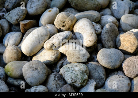 Natürliche abstrakte glatten runden Kieselsteinen meer Textur Hintergrund Stockfoto