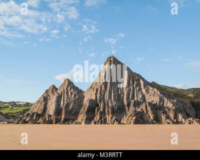 Klettern auf den drei Klippen an drei Cliff Bay, South Wales Stockfoto