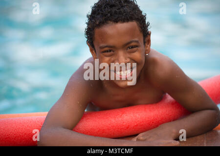 CommercSmilingial Strand schießen Stockfoto