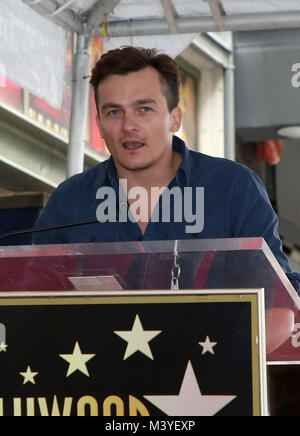 Los Angeles, Ca, USA. 12 Feb, 2018. Rupert Friend, an der Zeremonie feiern von Mandy Patinkin Stern auf dem Hollywood Walk of Fame in Los Angeles, Kalifornien am 12. Februar 2018. Credit: Faye Sadou/Medien Punch/Alamy leben Nachrichten Stockfoto