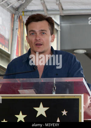 Los Angeles, Ca, USA. 12 Feb, 2018. Rupert Friend, an der Zeremonie feiern von Mandy Patinkin Stern auf dem Hollywood Walk of Fame in Los Angeles, Kalifornien am 12. Februar 2018. Credit: Faye Sadou/Medien Punch/Alamy leben Nachrichten Stockfoto