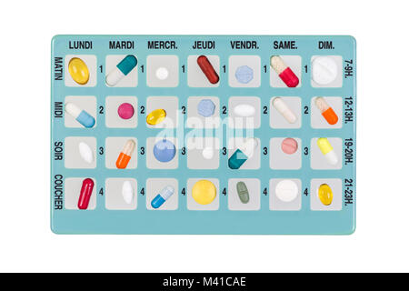 Blue Pill Box zur Aufbewahrung von Drogen, mit Inschriften in Französisch, der Moment des Tages der Woche auf Weiß Stockfoto