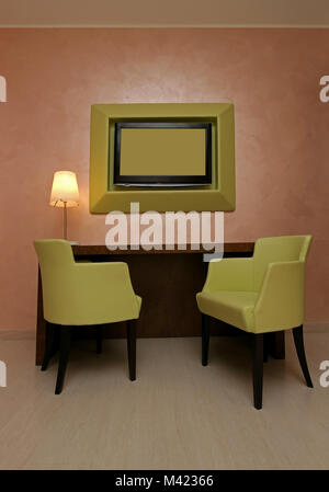 Grünen Ledersesseln und wall Frame in modernen Interieur Stockfoto