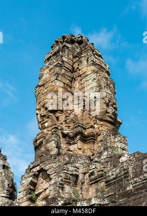 Stein Gesichter der Lokesvara am Bayon Tempel, Angkor Thom, Kambodscha Stockfoto