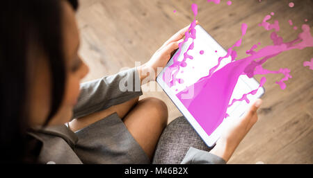 Zusammengesetzte Bild der rosa Farbe Spritzer und Tropfen Stockfoto