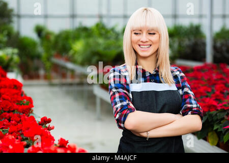 Florist Gärtner im Gewächshaus Stockfoto