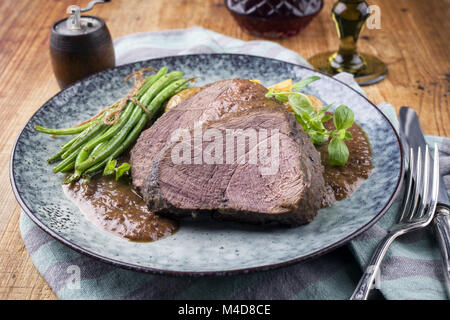 Wildbraten in Deer Sauce mit Gemüse Stockfoto