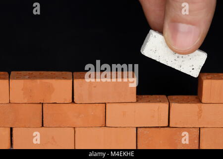 Wand und einem Backstein Stockfoto