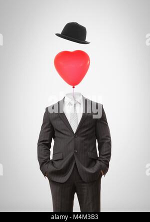 Mann ohne Kopf mit surreal floating Hut und Herz Ballon Stockfoto