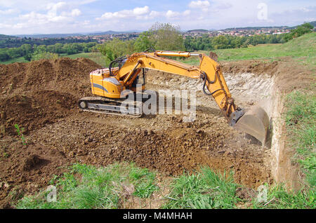 Bagger in Aktion während der Erde verschieben funktioniert Stockfoto