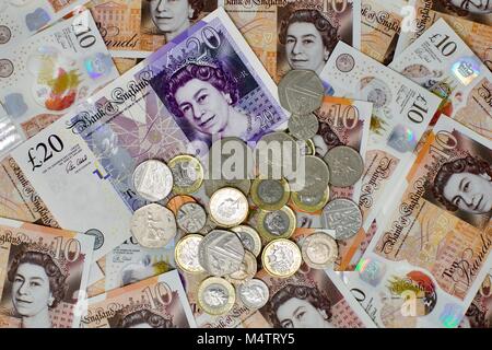 Britische Währung, Münzen und Banknoten Stockfoto