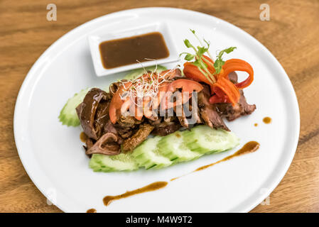 Loba Frittierte zimt Schweinefleisch Stockfoto