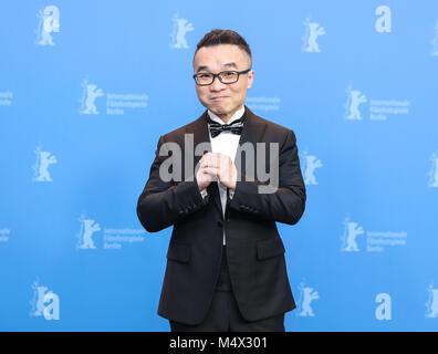 Berlin, Deutschland. 18 Feb, 2018. Direktor Raman Hui der Film 'Monster Jagd 2' Posen für Fotos bei einem Fotoshooting an der 68. Internationalen Filmfestspiele Berlin in Berlin, Deutschland, Jan. 18, 2018. Credit: Shan Yuqi/Xinhua/Alamy leben Nachrichten Stockfoto